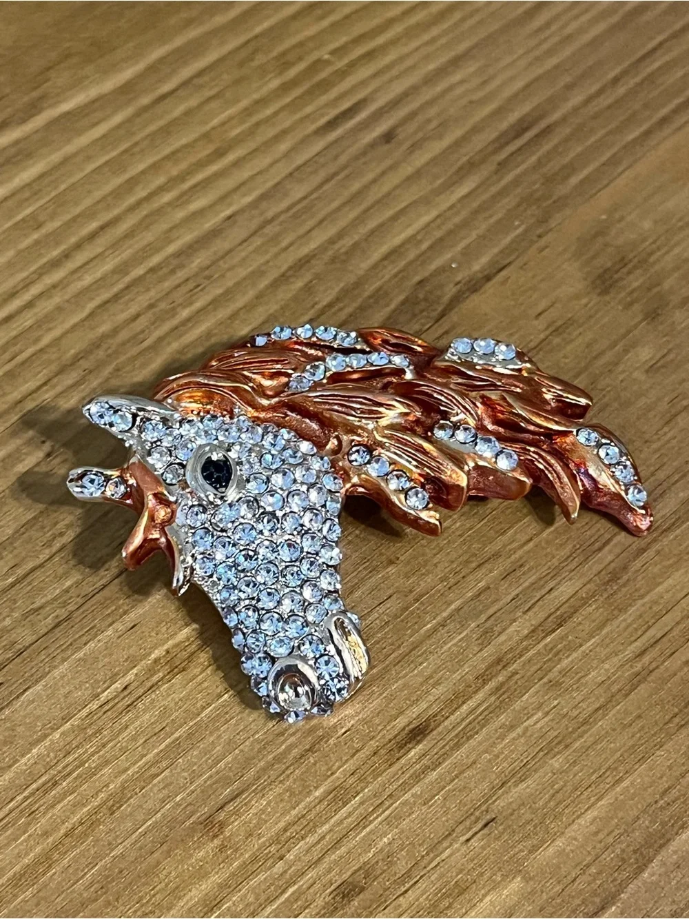 None this brooch